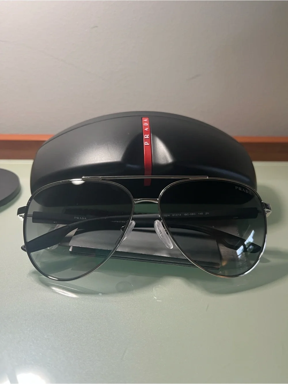 Prada Lina Rossa SPS 52W Silver Aviator Sunglasses with Black/Grey Lenses